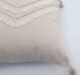 Handmade decorative tassel cushion in natural shade