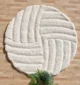 Soft shaggy rug with plush texture, modern design, and cozy comfort for home décor.
