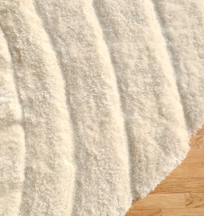 Soft shaggy rug with plush texture, modern design, and cozy comfort for home décor.