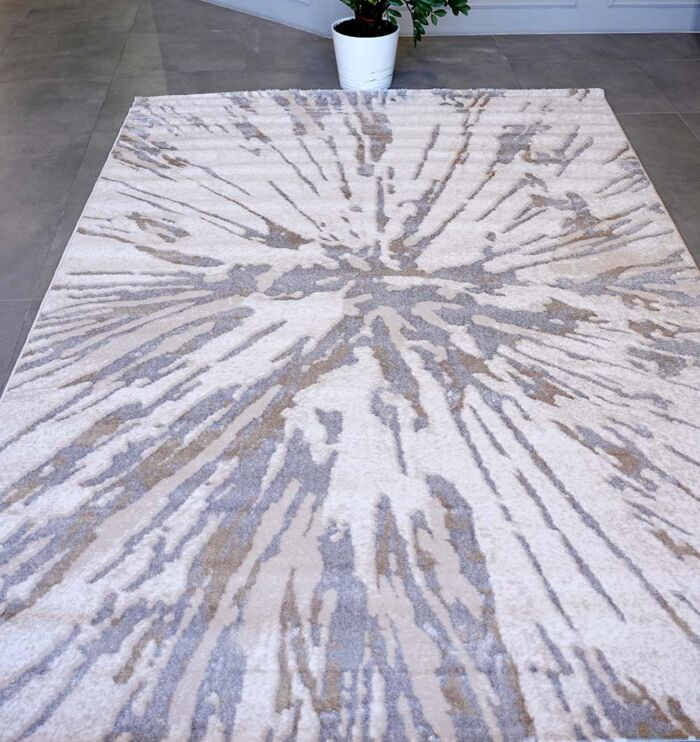 Machine-made rug with durable construction, stylish design, and easy-care comfort for modern homes.