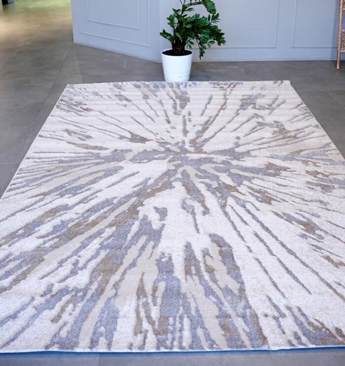 Machine-made rug with durable construction, stylish design, and easy-care comfort for modern homes.