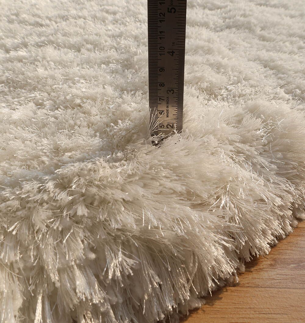 Shaggy Rugs Dubai Luxury Handmade Rugs & Carpets Online UAE Plush shaggy rug for cozy flooring, handmade rugs Dubai, dining table rugs, and outdoor rugs