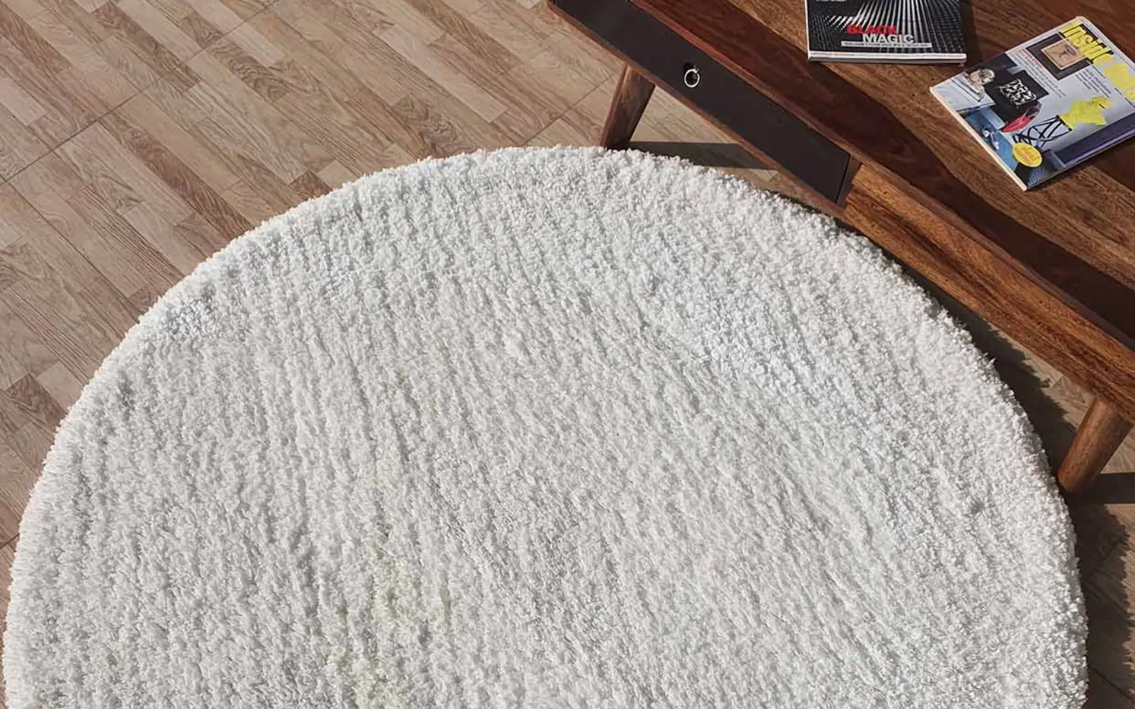 Soft plush rug in a cozy living room setting, perfect for adding comfort and style.