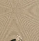 Handmade natural braided jute rug with eco-friendly design, rustic charm, and durable craftsmanship.
