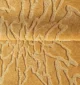 Handmade wool rug with intricate design, soft texture, and timeless decorative appeal for home interiors.