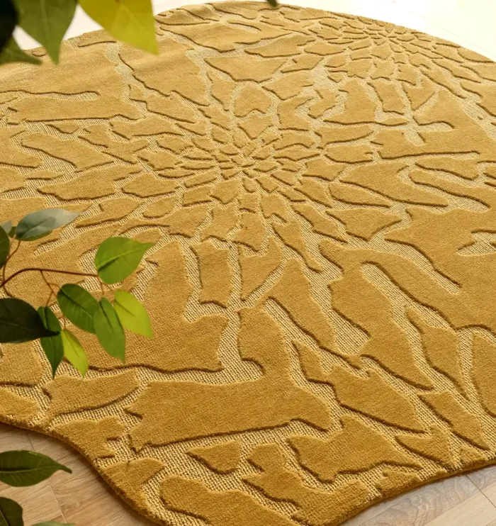 Handmade wool rug with intricate design, soft texture, and timeless decorative appeal for home interiors.