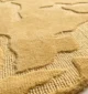 Handmade wool rug with intricate design, soft texture, and timeless decorative appeal for home interiors.