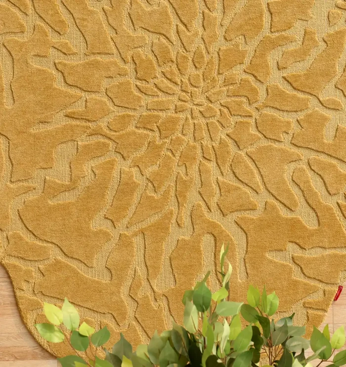 Handmade wool rug with intricate design, soft texture, and timeless decorative appeal for home interiors.