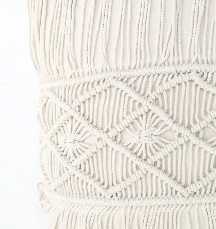 Natural white macrame cushion with handcrafted detailing, soft texture, and stylish home décor appeal.
