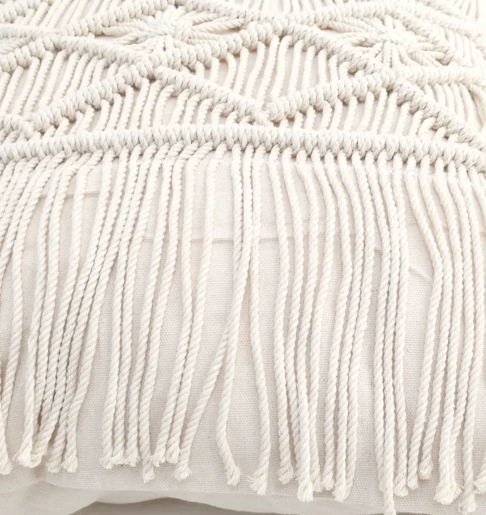 Natural white macrame cushion with handcrafted detailing, soft texture, and stylish home décor appeal.