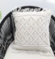 Natural white macrame cushion with handcrafted detailing, soft texture, and stylish home décor appeal.