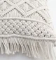 Natural white macrame cushion with handcrafted detailing, soft texture, and stylish home décor appeal.