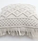 Natural white macrame cushion with handcrafted detailing, soft texture, and stylish home décor appeal.