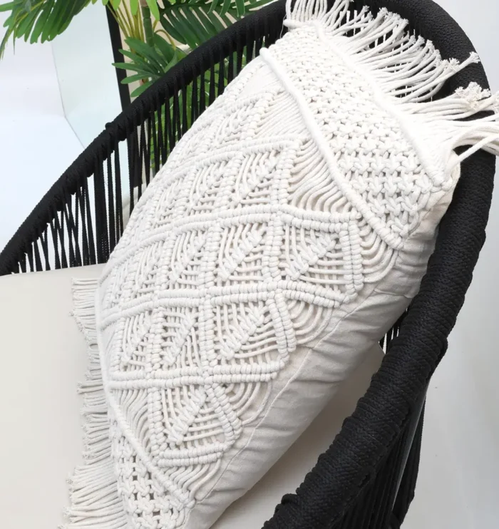 Natural white macrame cushion with handcrafted detailing, soft texture, and stylish home décor appeal.