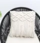Natural white macrame cushion with handcrafted detailing, soft texture, and stylish home décor appeal.