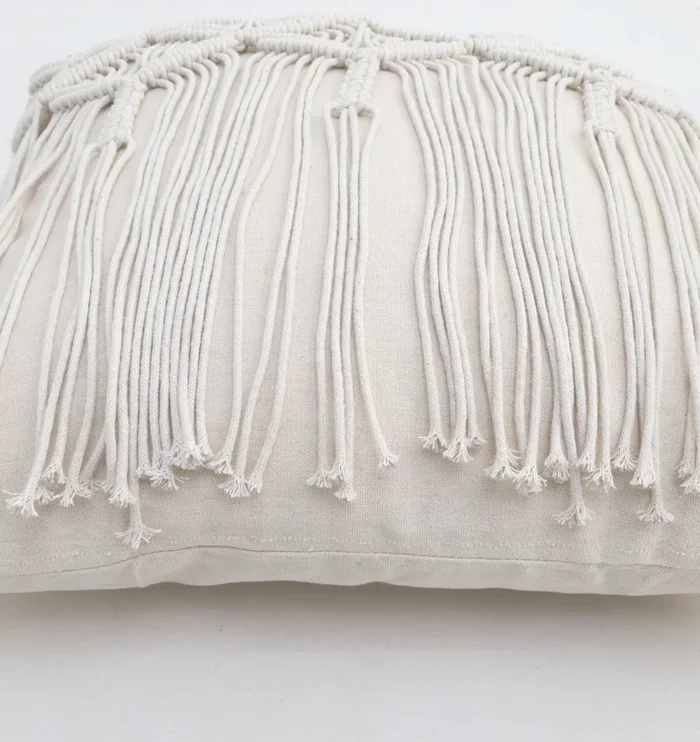 Natural white macrame cushion with handcrafted detailing, soft texture, and stylish home décor appeal.