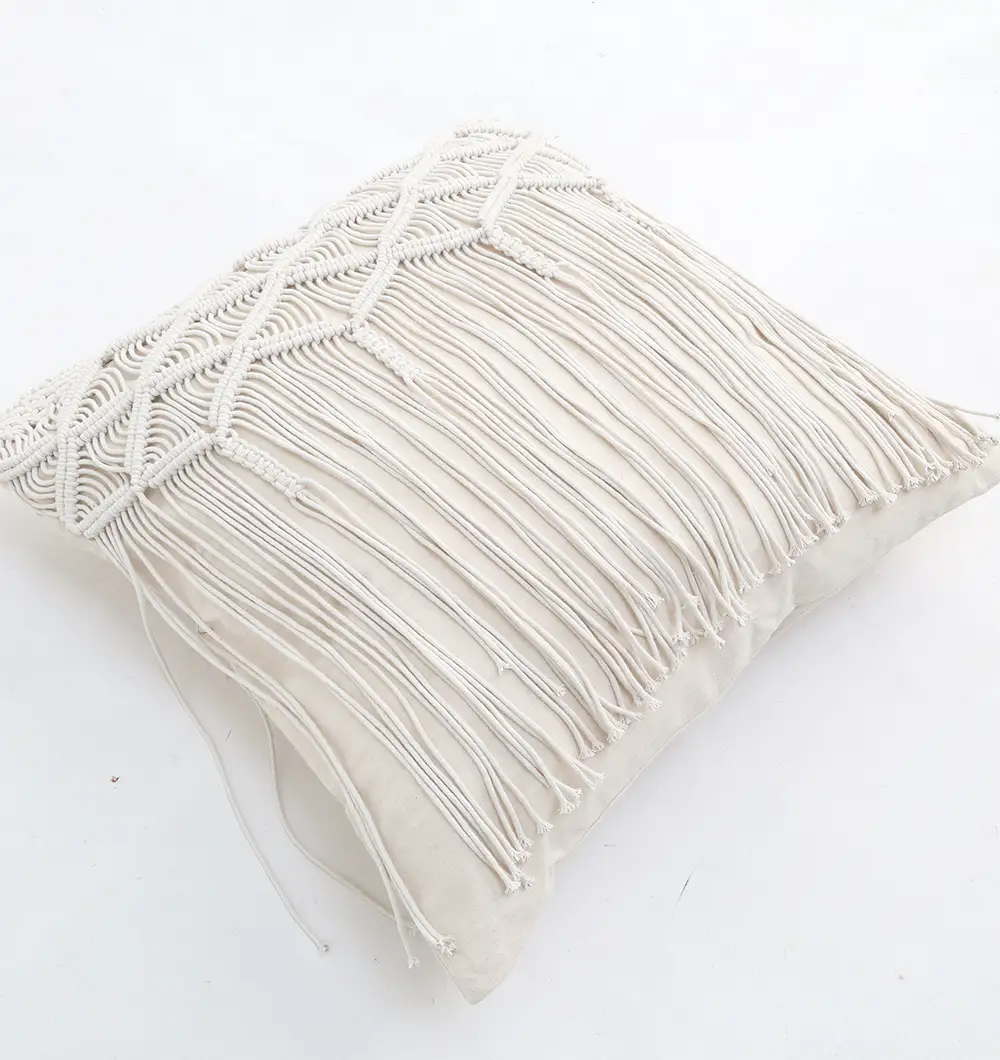 Natural White Macrame Cushion – Handcrafted Elegance & Cozy Charm Natural white macrame cushion with handcrafted detailing, soft texture, and stylish home décor appeal.
