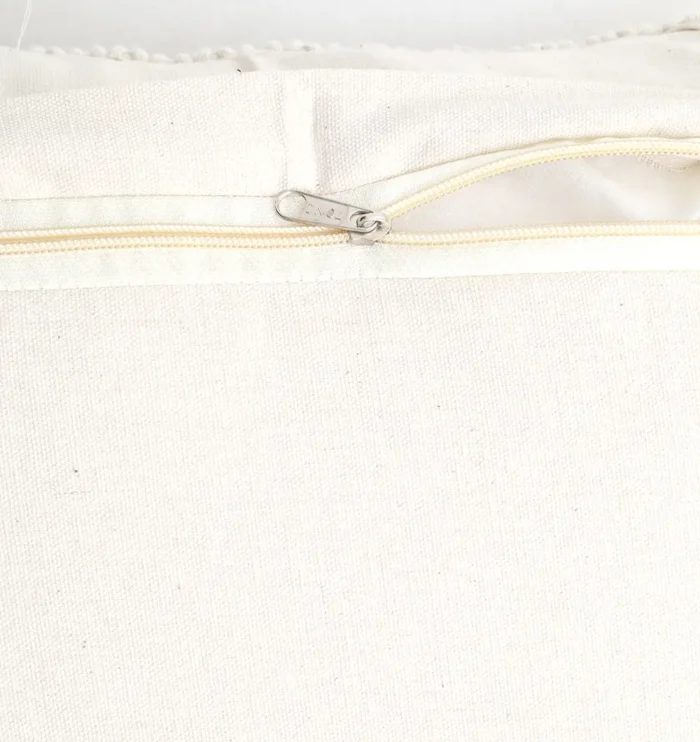 Natural white macrame cushion with handcrafted detailing, soft texture, and stylish home décor appeal.