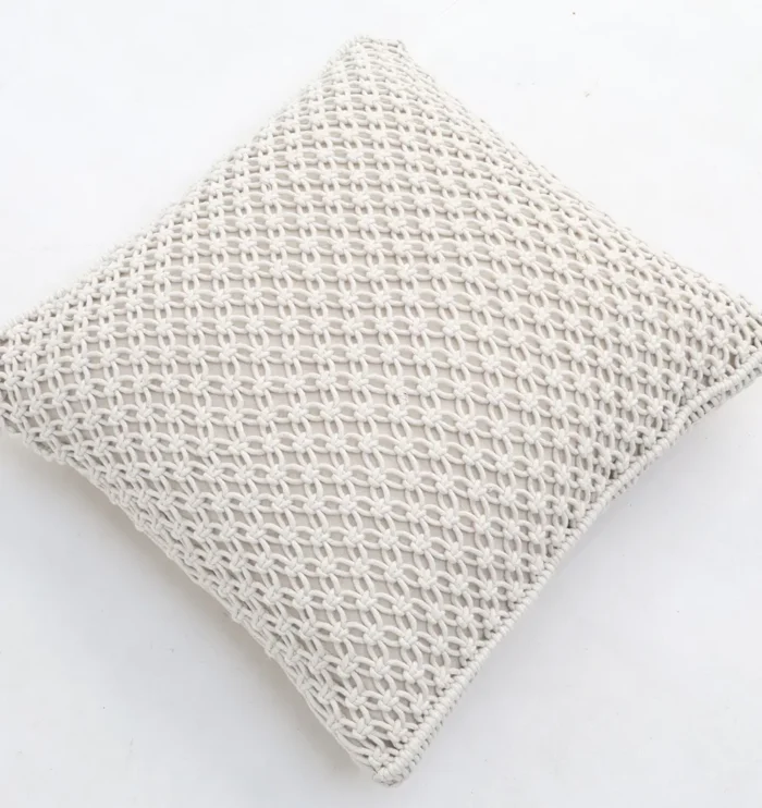 Natural white macrame cushion with handcrafted detailing, soft texture, and stylish home décor appeal.