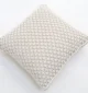 Natural white macrame cushion with handcrafted detailing, soft texture, and stylish home décor appeal.