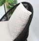 Natural white macrame cushion with handcrafted detailing, soft texture, and stylish home décor appeal.