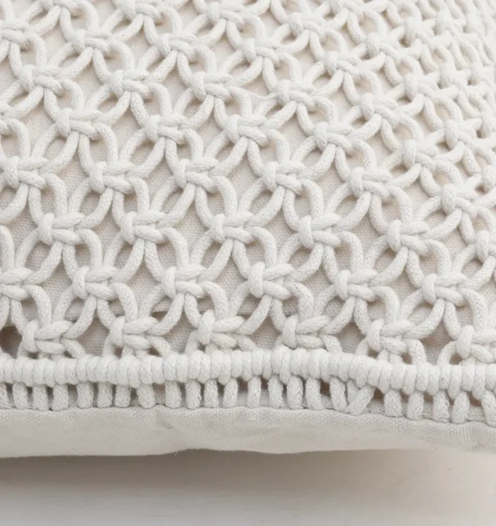 Natural white macrame cushion with handcrafted detailing, soft texture, and stylish home décor appeal.