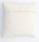 Natural white macrame cushion with handcrafted detailing, soft texture, and stylish home décor appeal.