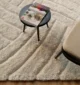 Soft shaggy rug with plush texture, modern design, and cozy comfort for home décor.