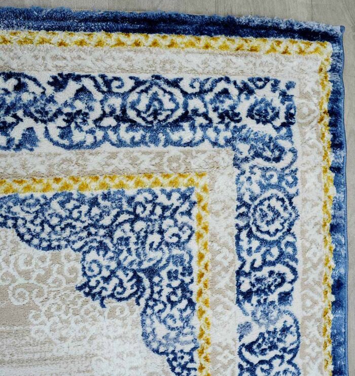 Machine-made rug with durable construction, stylish design, and easy-care comfort for modern homes.