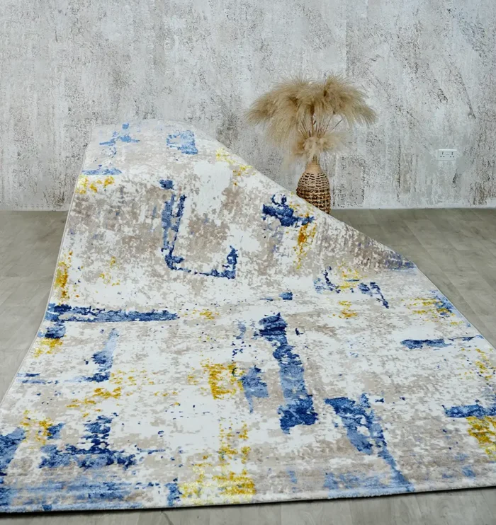 Machine-made rug featuring precision weaving, elegant style, and durable quality for everyday living.