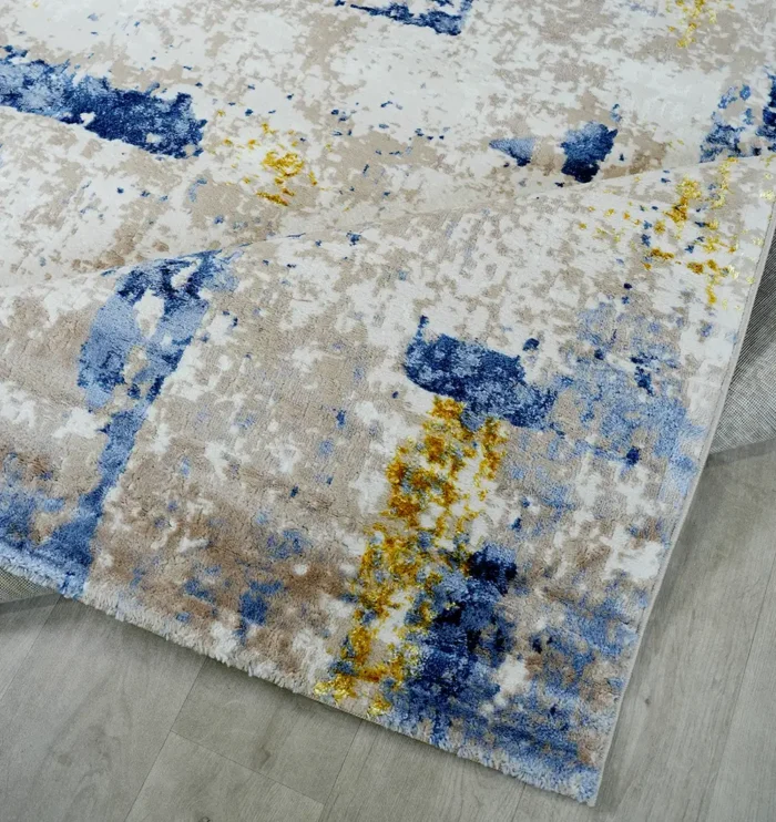 Machine-made rug featuring precision weaving, elegant style, and durable quality for everyday living.