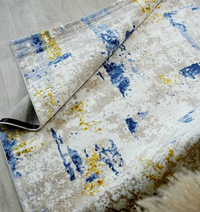 Machine-made rug featuring precision weaving, elegant style, and durable quality for everyday living.