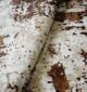 Machine-made rug with durable construction, stylish design, and easy-care comfort for modern homes.
