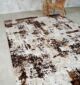 Machine-made rug with durable construction, stylish design, and easy-care comfort for modern homes.