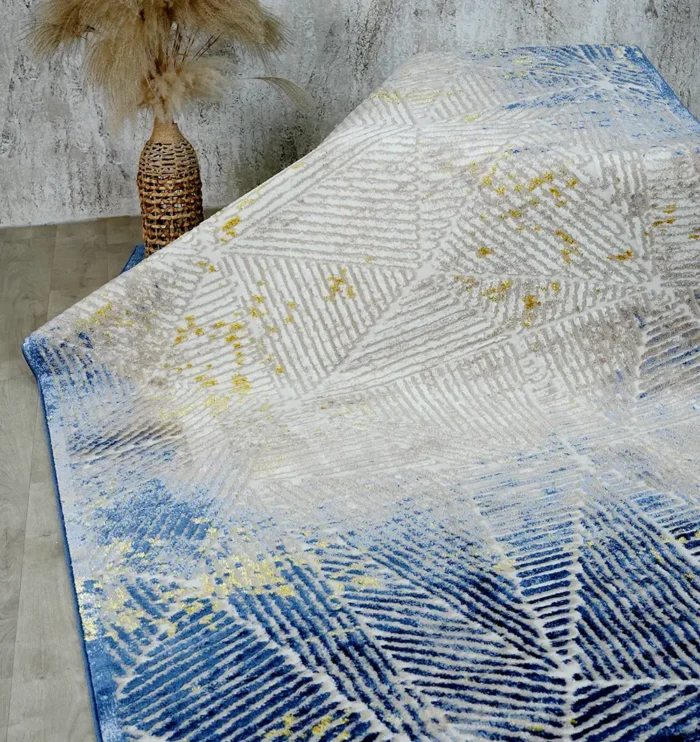 Machine-made rug featuring precision weaving, elegant style, and durable quality for everyday living.