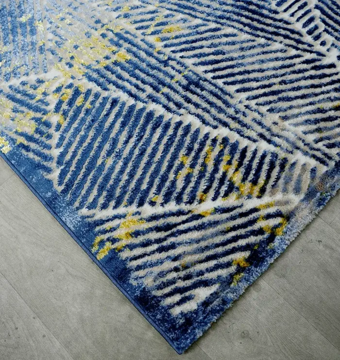 Machine-made rug featuring precision weaving, elegant style, and durable quality for everyday living.