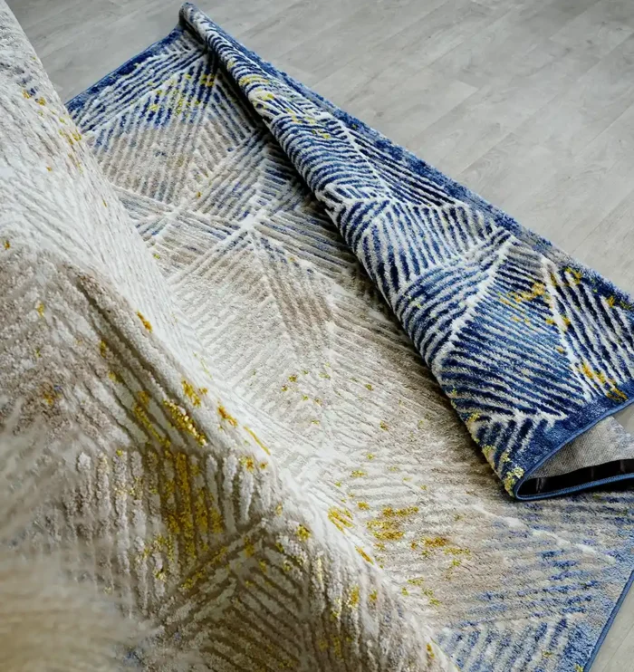 Machine-made rug featuring precision weaving, elegant style, and durable quality for everyday living.