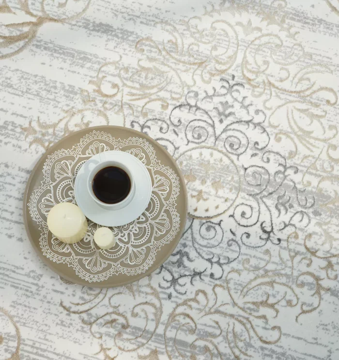 Durable machine-made rug with modern patterns, soft finish, and versatile design for home décor.