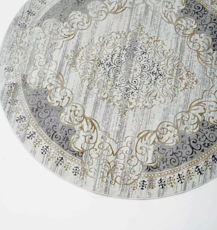 Durable machine-made rug with modern patterns, soft finish, and versatile design for home décor.