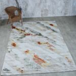 Machine-made rug with durable construction, stylish design, and easy-care comfort for modern homes.