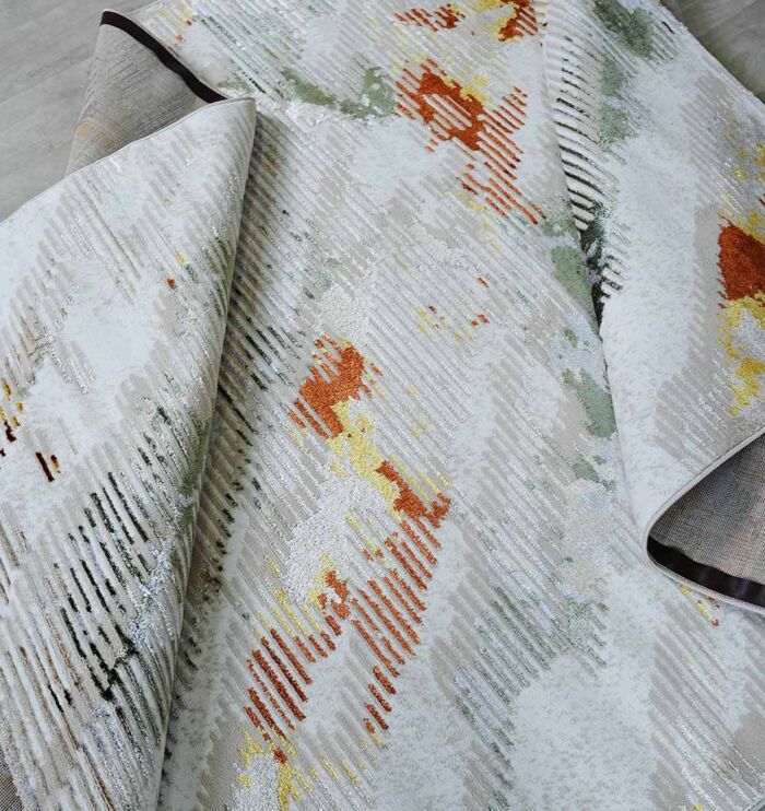 Machine-made rug with durable construction, stylish design, and easy-care comfort for modern homes.
