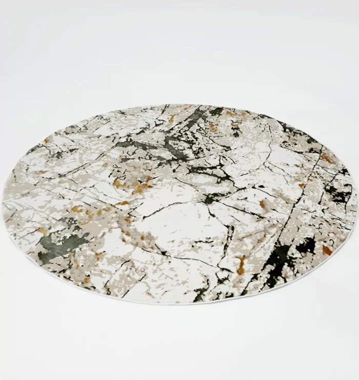 Durable machine-made rug with modern patterns, soft finish, and versatile design for home décor.