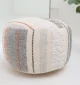 Decorative pouf for living room with stylish design, soft comfort, and versatile functionality.