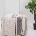 Decorative pouf for living room with stylish design, soft comfort, and versatile functionality.