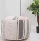 Decorative pouf for living room with stylish design, soft comfort, and versatile functionality.