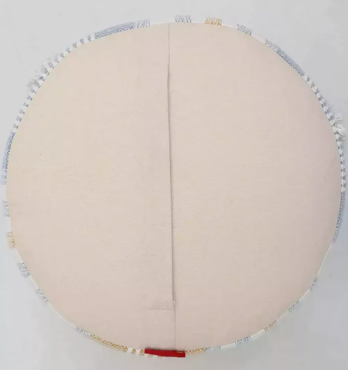 Decorative pouf for living room with stylish design, soft comfort, and versatile functionality.