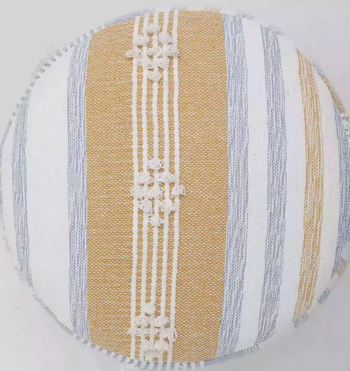 Decorative pouf for living room with stylish design, soft comfort, and versatile functionality.