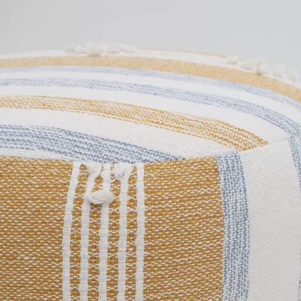 Decorative pouf for living room with stylish design, soft comfort, and versatile functionality.