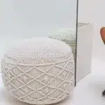 Decorative pouf for living room with stylish design, soft comfort, and versatile functionality.