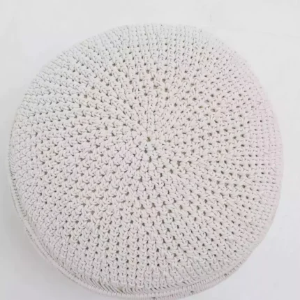Decorative pouf for living room with stylish design, soft comfort, and versatile functionality.